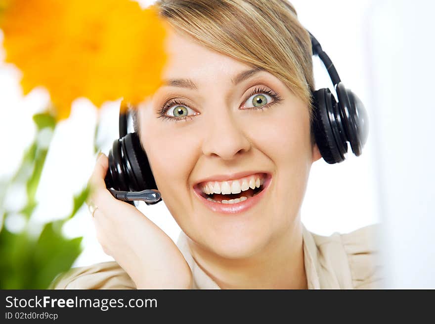 Portrait of beautiful smiling excited call center woman with headset. Portrait of beautiful smiling excited call center woman with headset