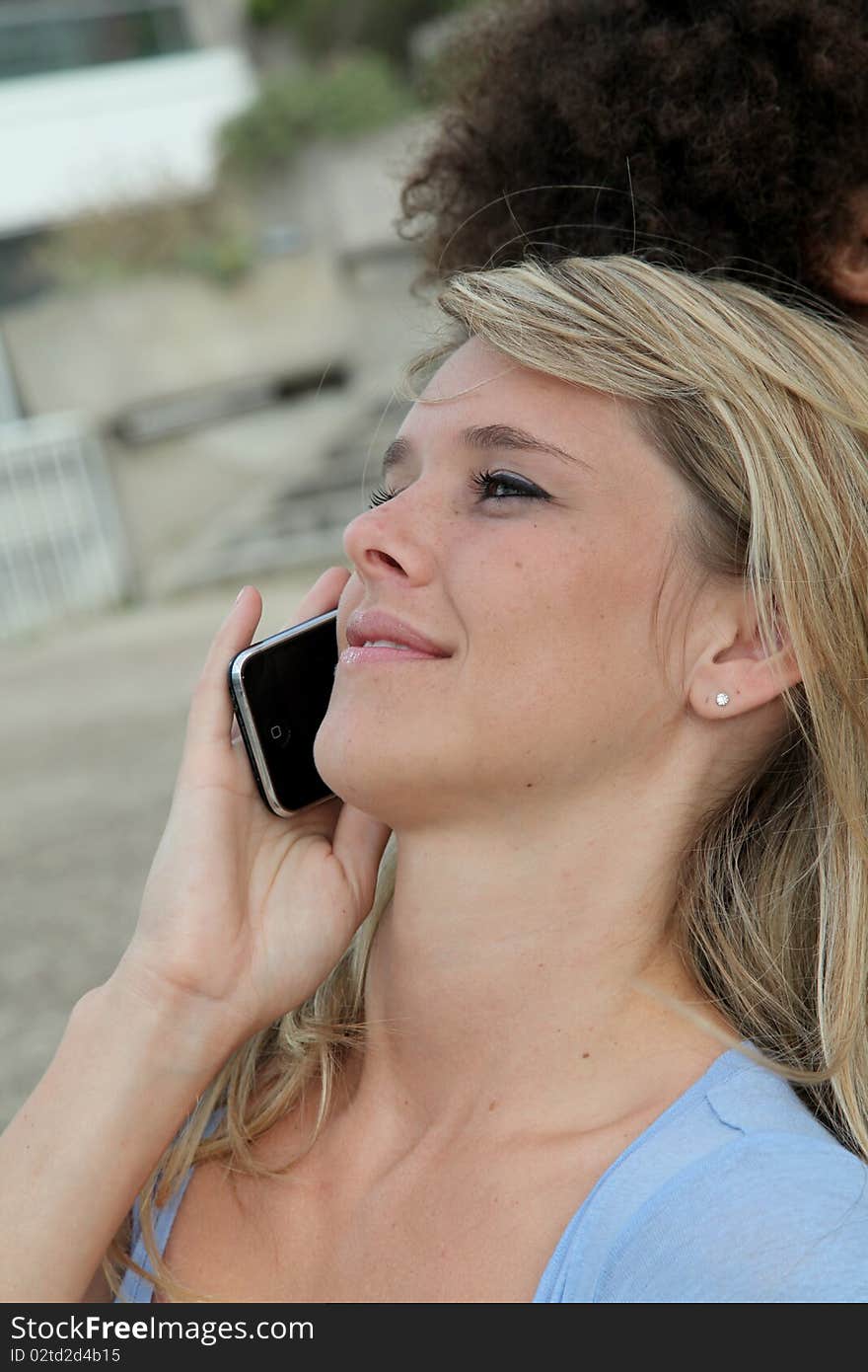 Beautiful blond woman on the phone