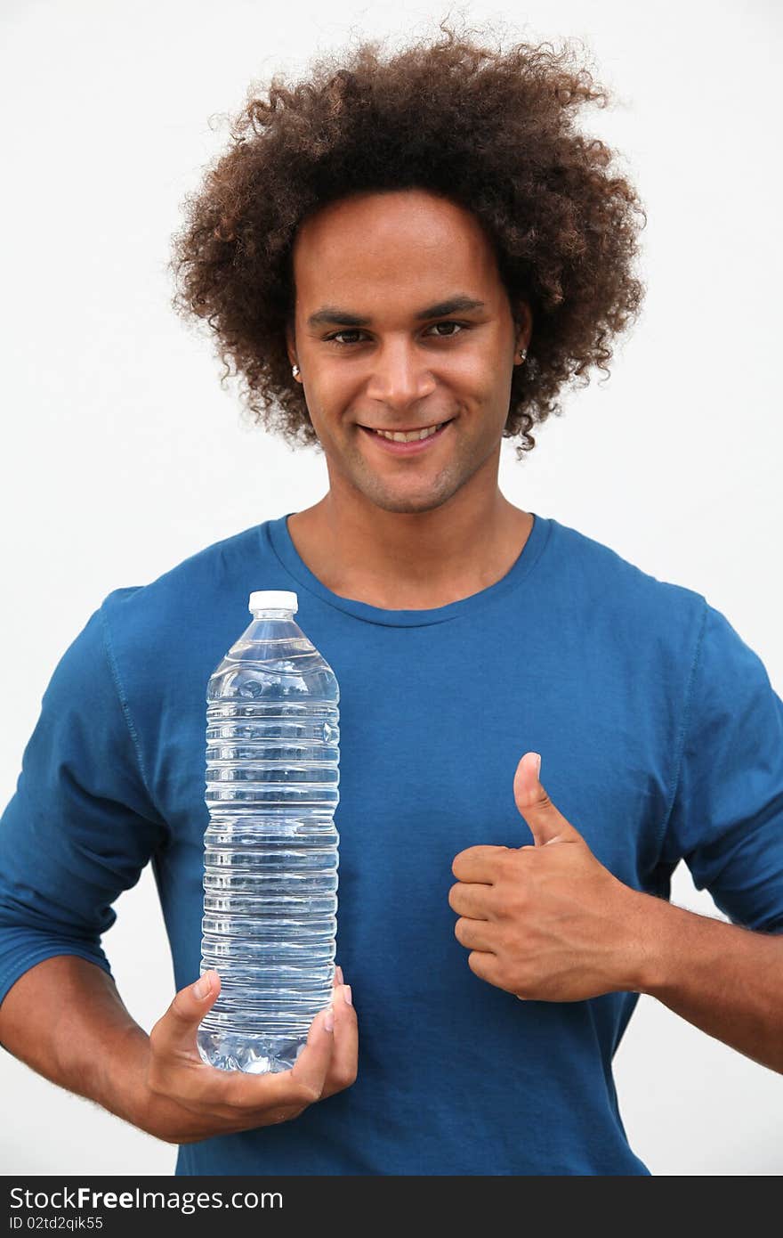 Closeup of man holding plastic bottle. Closeup of man holding plastic bottle