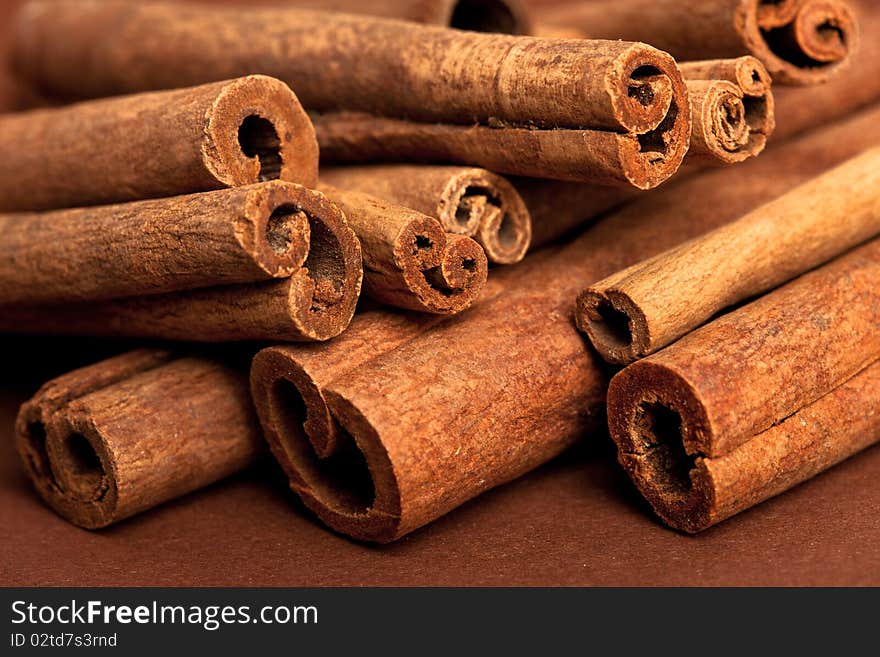 Cinnamon sticks on brown