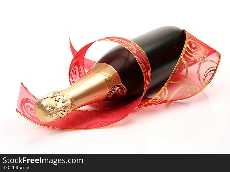 Champagne and tape on a white background