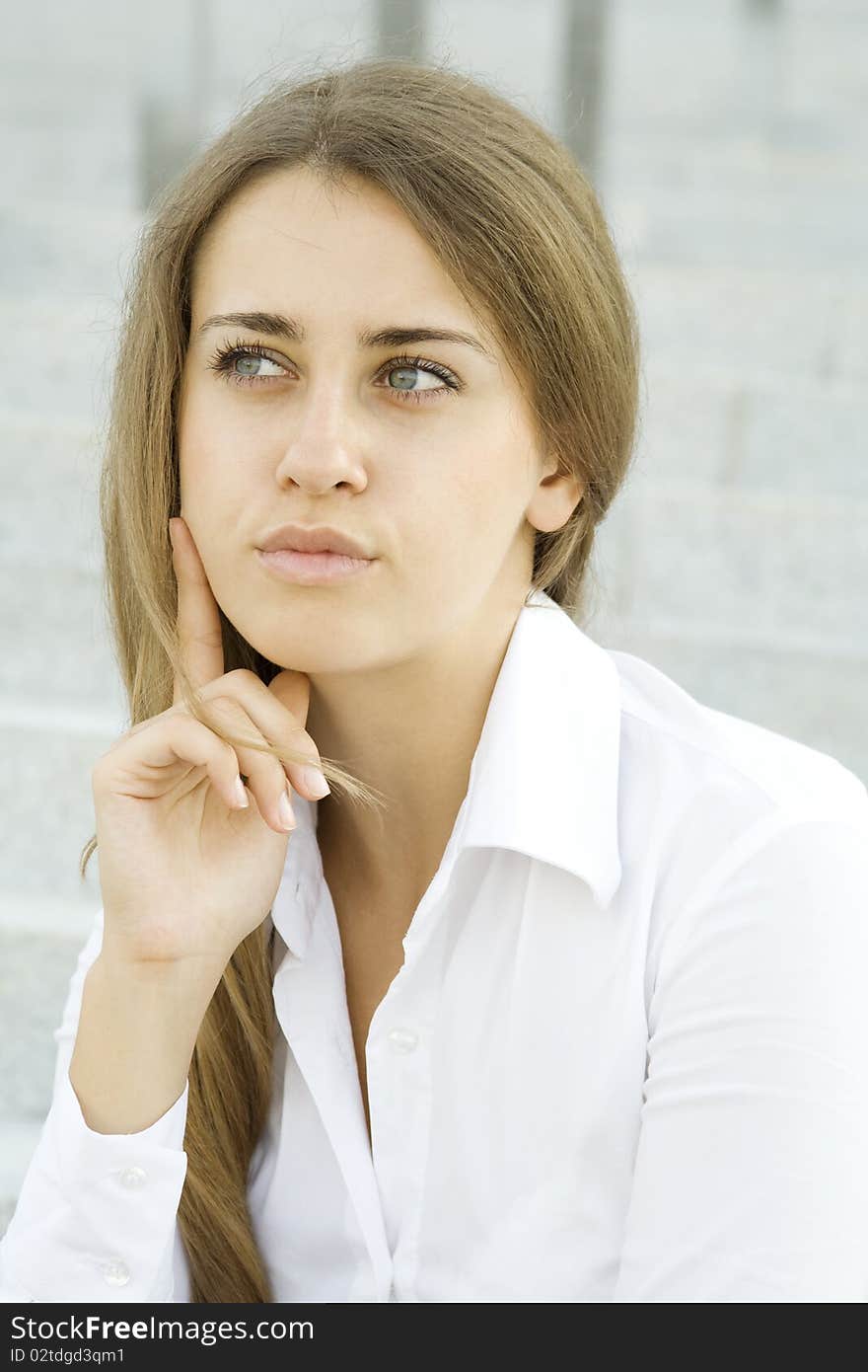 Young Businesswoman Wondering