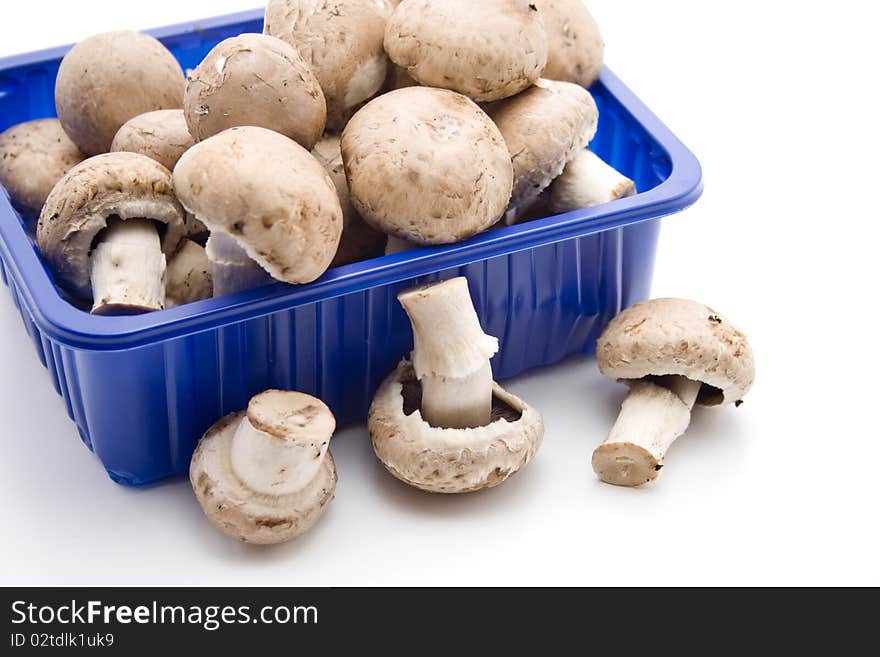 Champignon mushrooms in the packaging