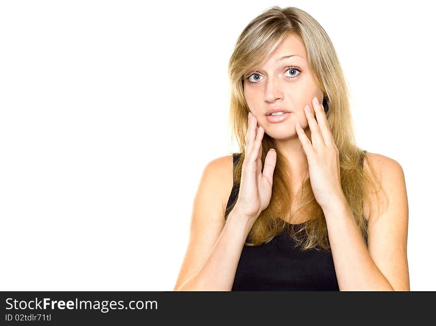 Close-up of a young woman looking surprised on white background