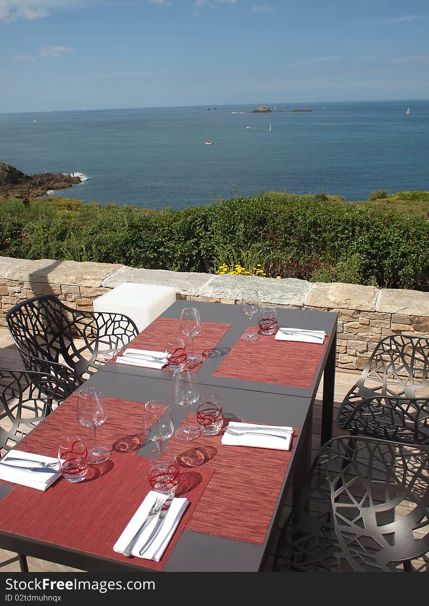 Table setting at beach restaurant in hotel resort