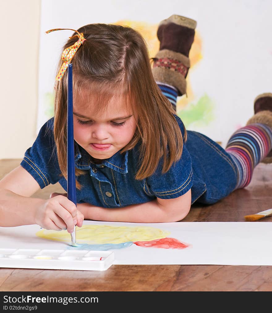 Child Painting Flower