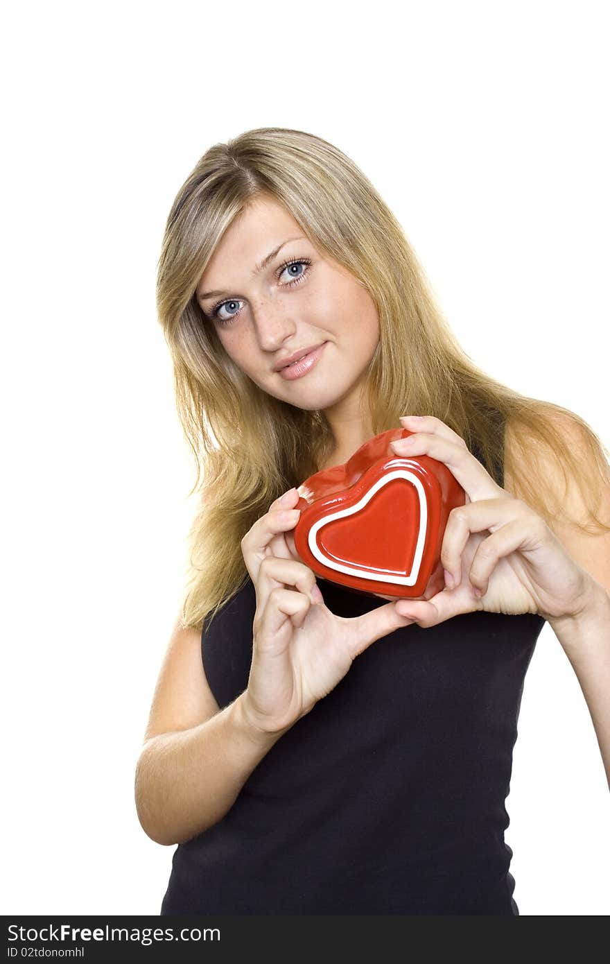 Smiling Young Woman Holding a red Heart. Lots of copyspace and room for text on this isolate. Smiling Young Woman Holding a red Heart. Lots of copyspace and room for text on this isolate