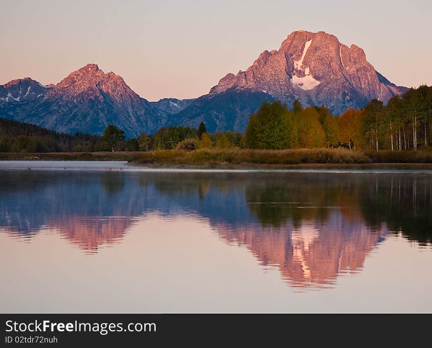 Early morning reflection of Mt. Moran at Oxbow Bend in Grand Teton National Park. Early morning reflection of Mt. Moran at Oxbow Bend in Grand Teton National Park.