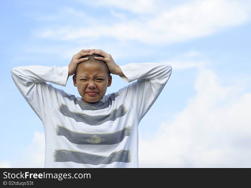 Exasperated Bald Female Holding Head