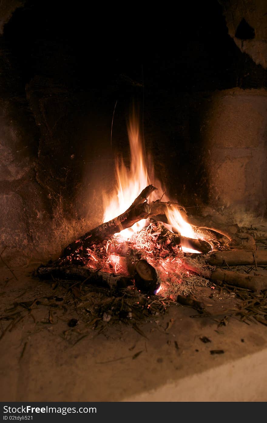 Burning wood in fireplace