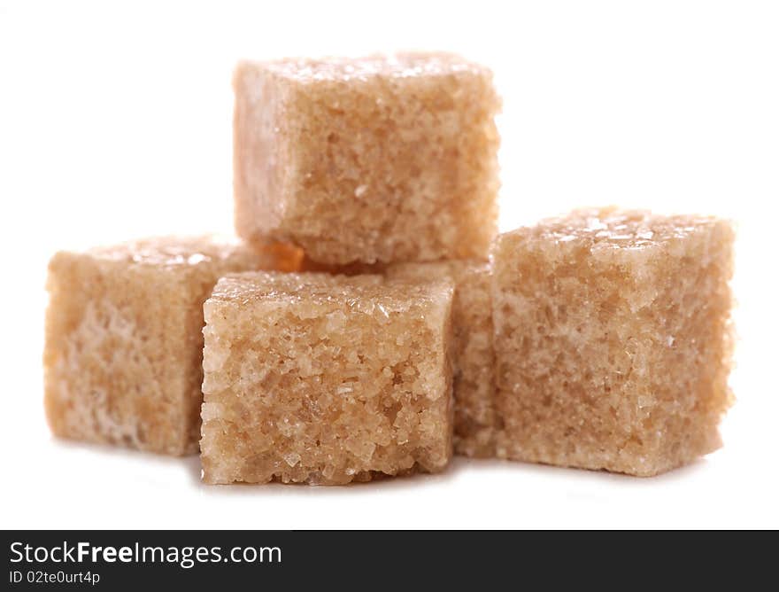 Pile of brown demerara sugar cubes