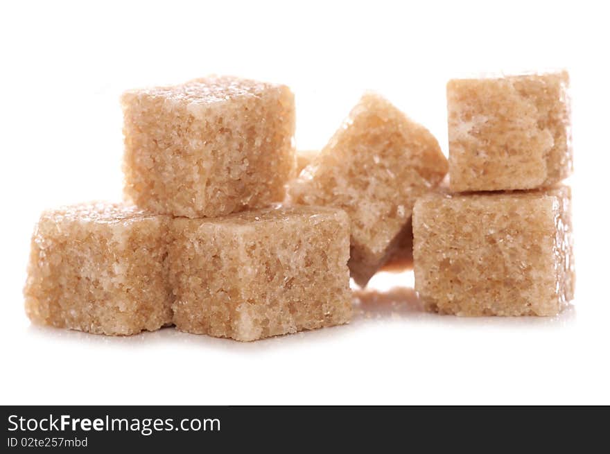 Pile of brown demerara sugar cubes