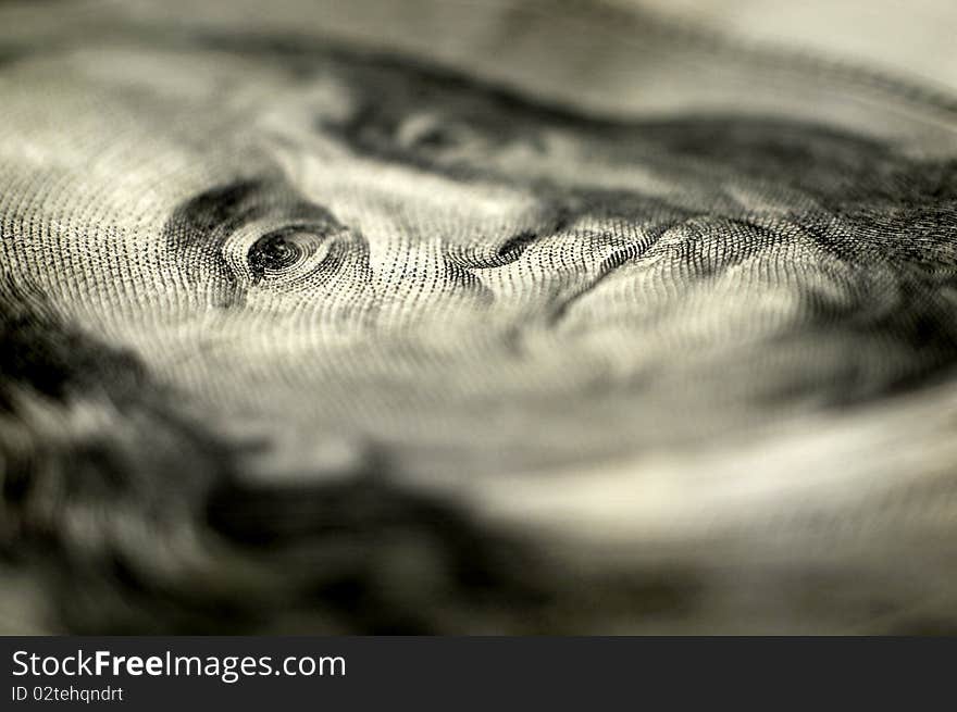 Closeup of hundred dollar bill isolated on white background. Closeup of hundred dollar bill isolated on white background