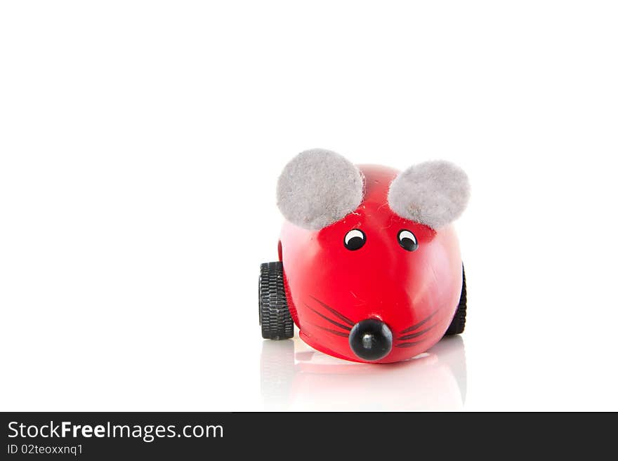 A wooden toy mouse