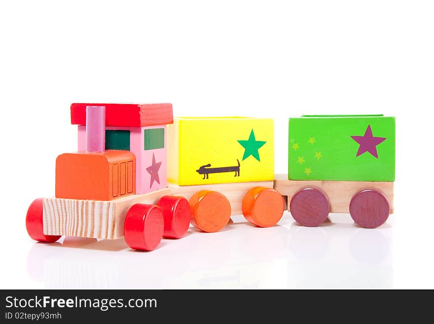 A colorfol wooden toytrain isolated over white