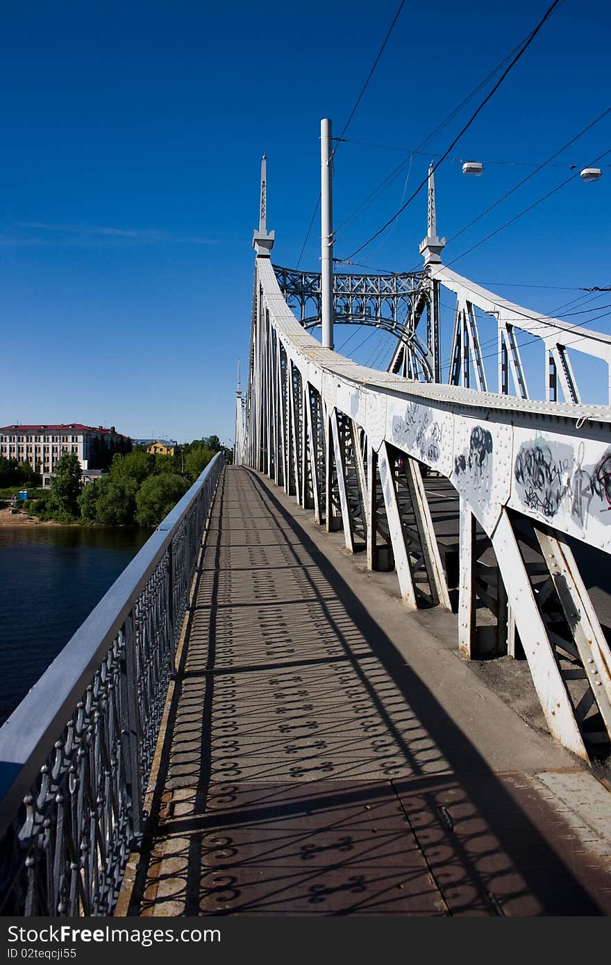 Old bridge at summer sunny day