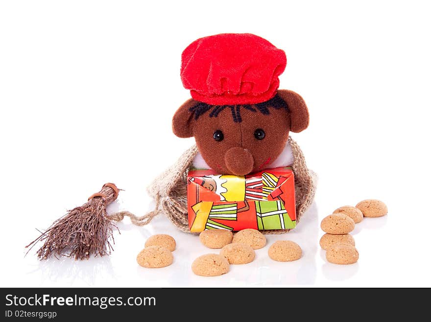 A typical Dutch celebration with gifts and gingerbread isolated over white