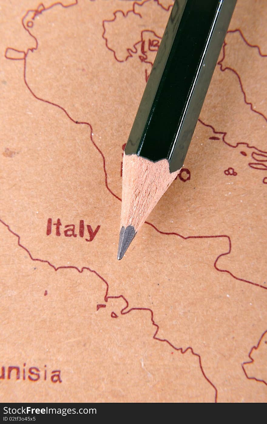 A pencil putting on a European map, means business and travel concept. A pencil putting on a European map, means business and travel concept.