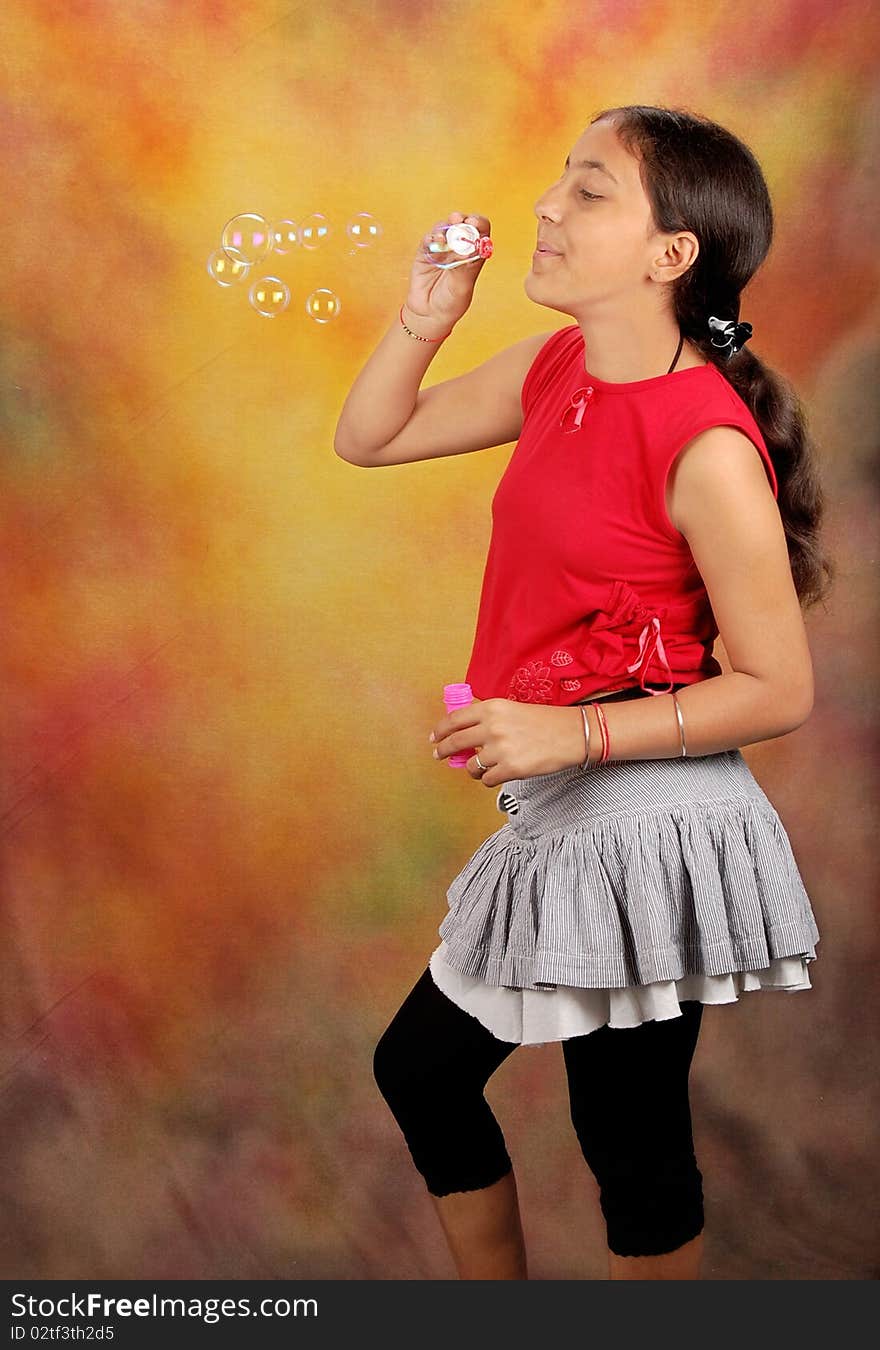 Beautiful girl blowing the bubbles. Beautiful girl blowing the bubbles