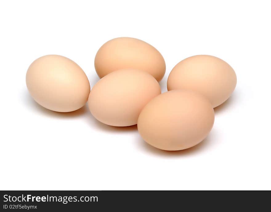 Brown eggs isolated on white