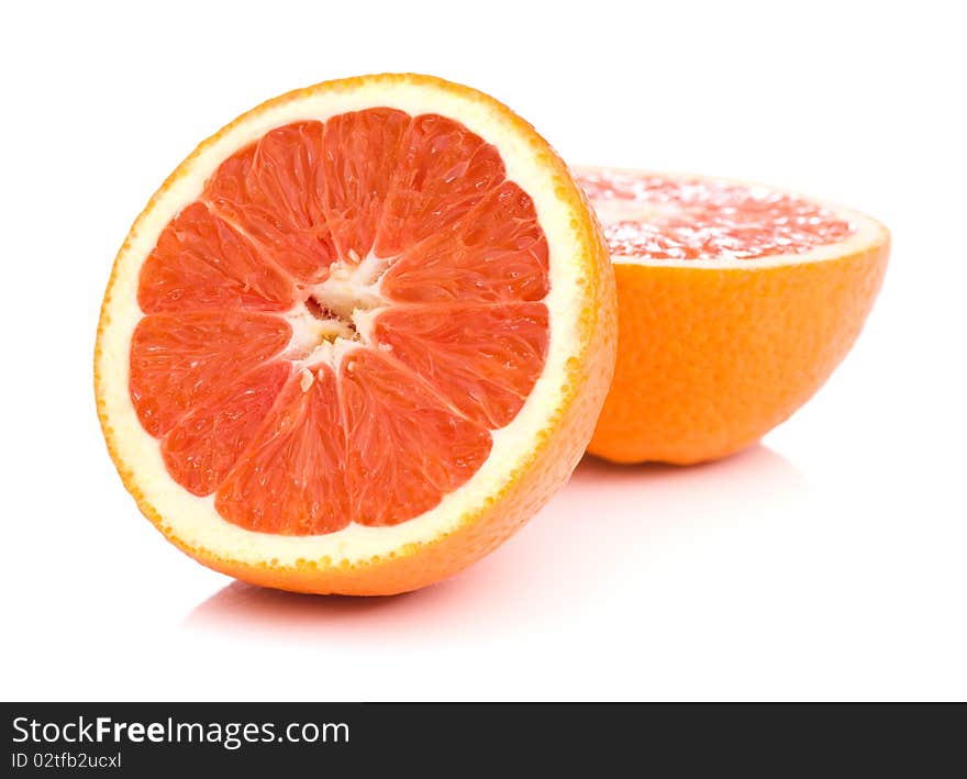 Half of Sicilian orange isolated on white background