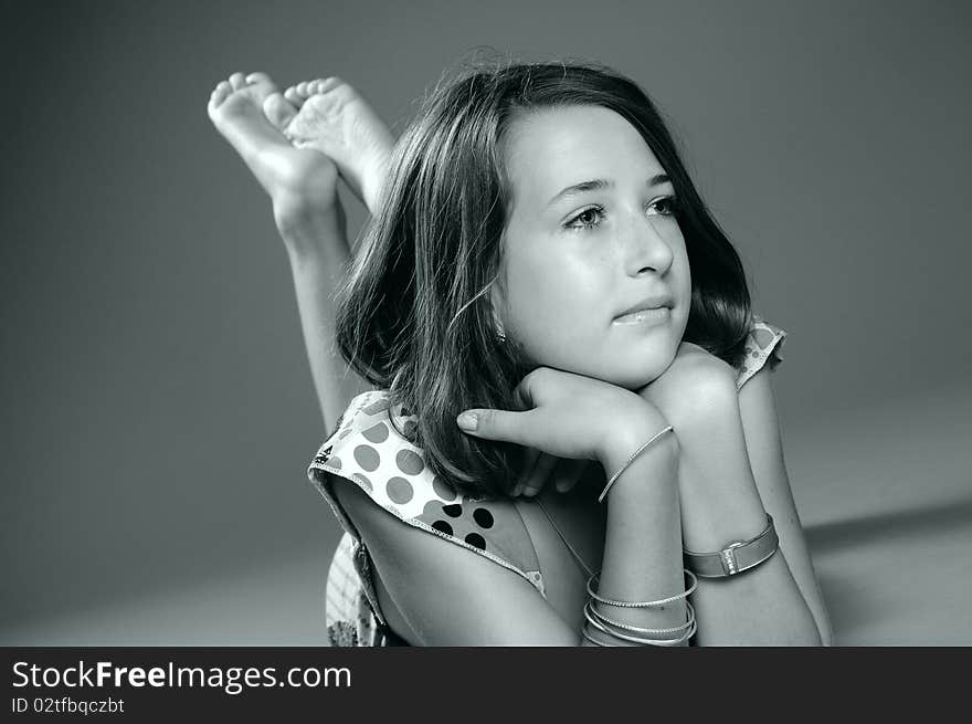 White teenager showing accessories in studio. White teenager showing accessories in studio