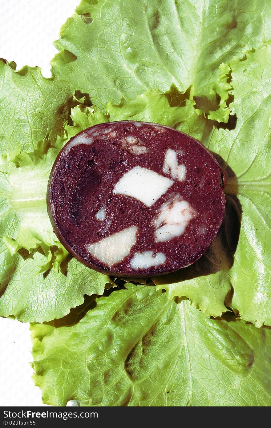 Blood Sausage On Salad Leaves