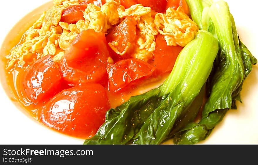 Scrambled eggs with tomatoes ,the most common home cooking in china. Scrambled eggs with tomatoes ,the most common home cooking in china.