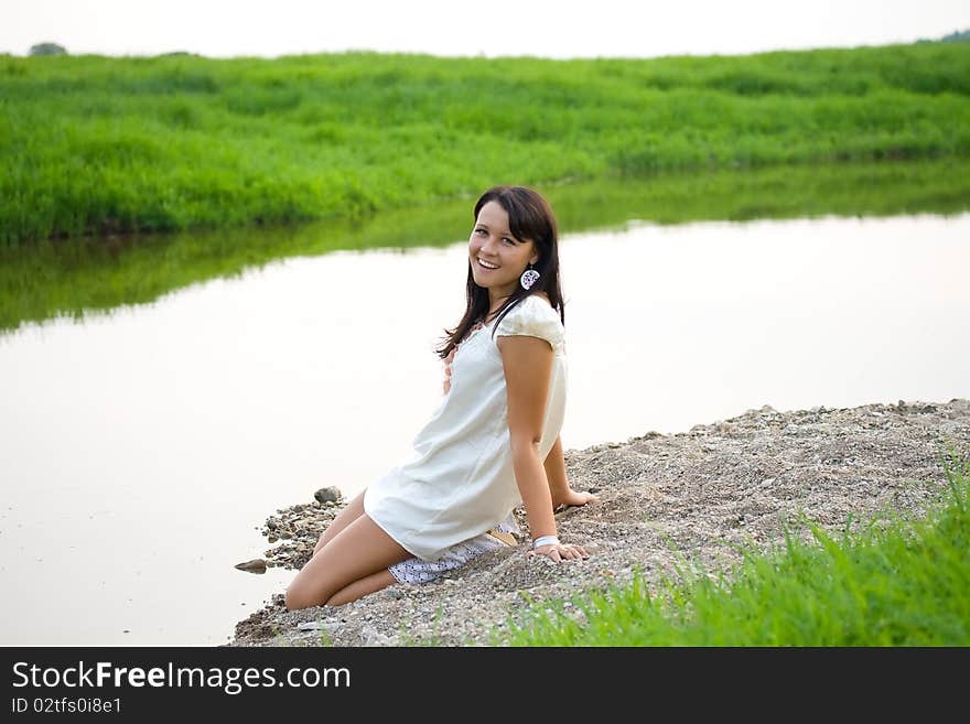 Pretty young woman in nature.