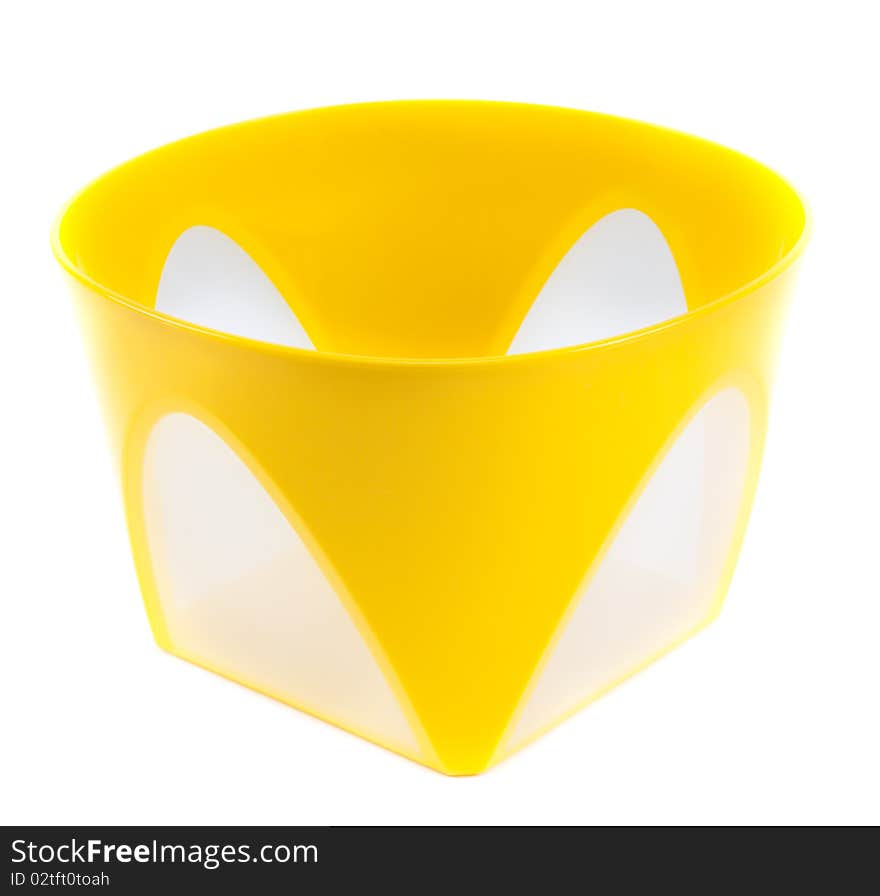 Yellow plastic container with transparent wall on white background