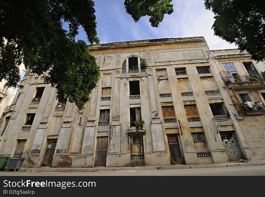 Old Havana building with shabby and crumbling facade. Old Havana building with shabby and crumbling facade