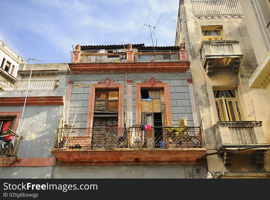 Detail of colorful and shabby Havana building facade. Detail of colorful and shabby Havana building facade