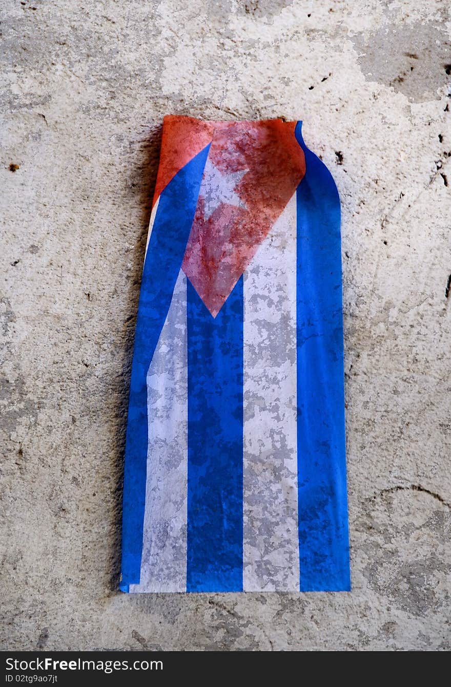 Abstract cuban paper flag over eroded wall texture. Abstract cuban paper flag over eroded wall texture