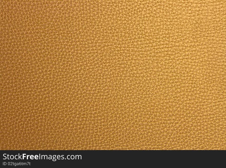 Golden fake leather surfaced