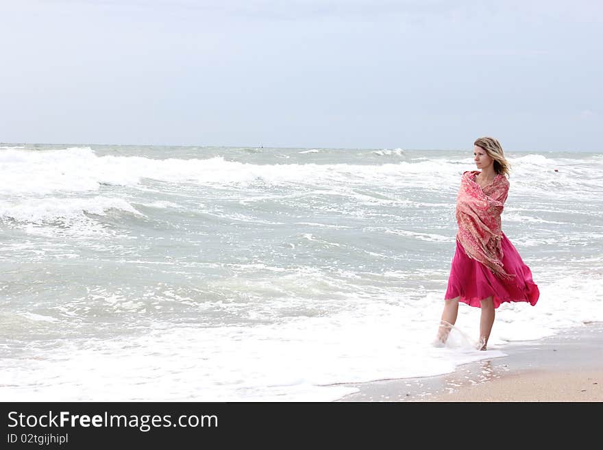 Woman Standing Near The Sea