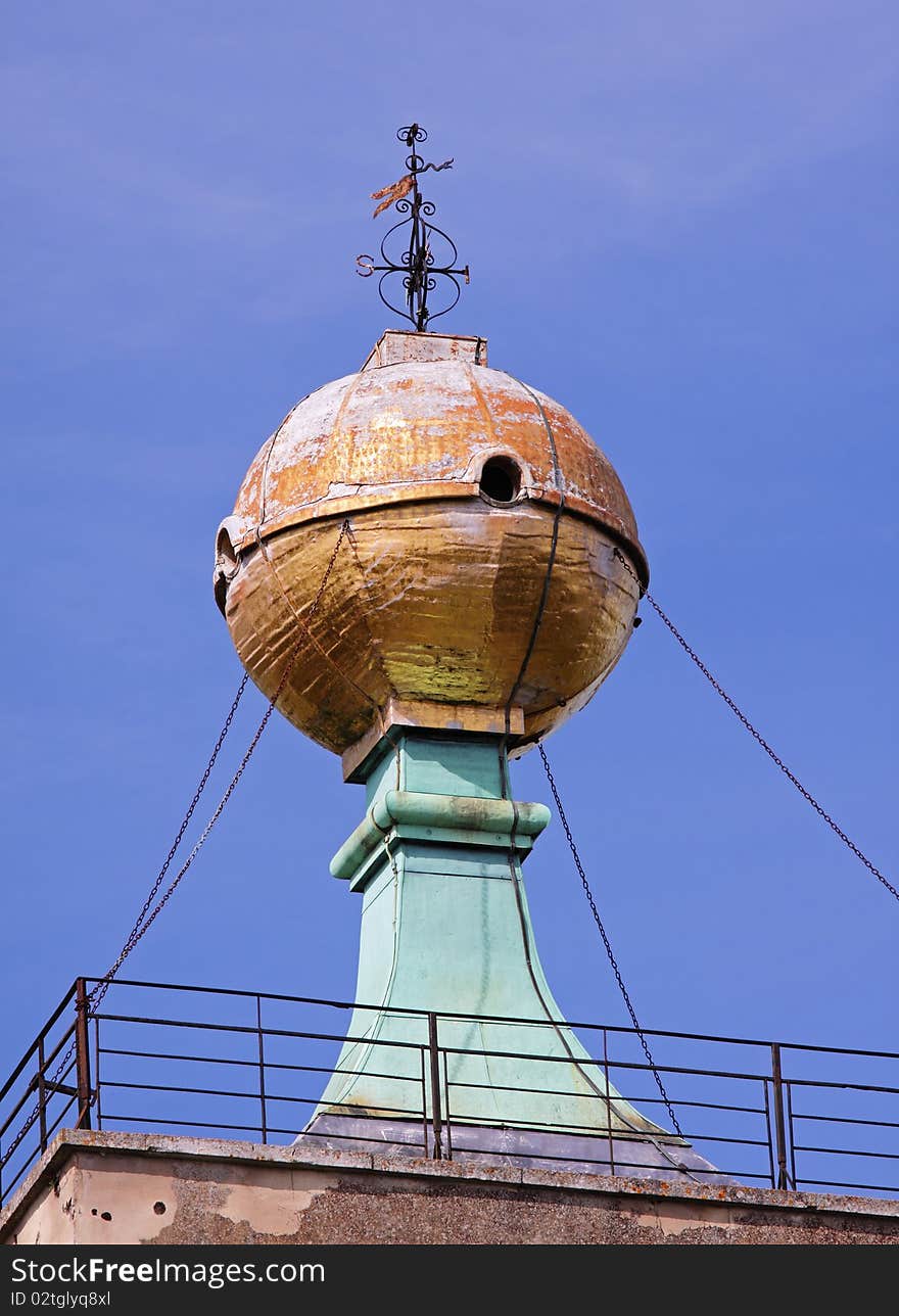 The Golden Ball Monument and weathervain on top of West Wycombe Church Tower in England