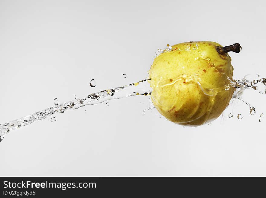 Yellow Pear In Water Splash