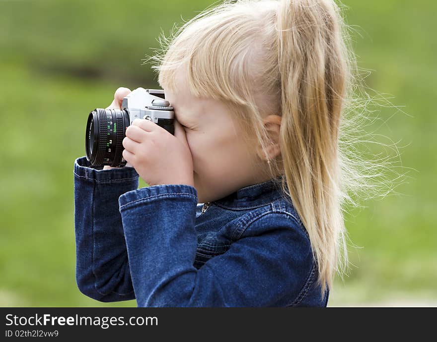 Little girl with the camera