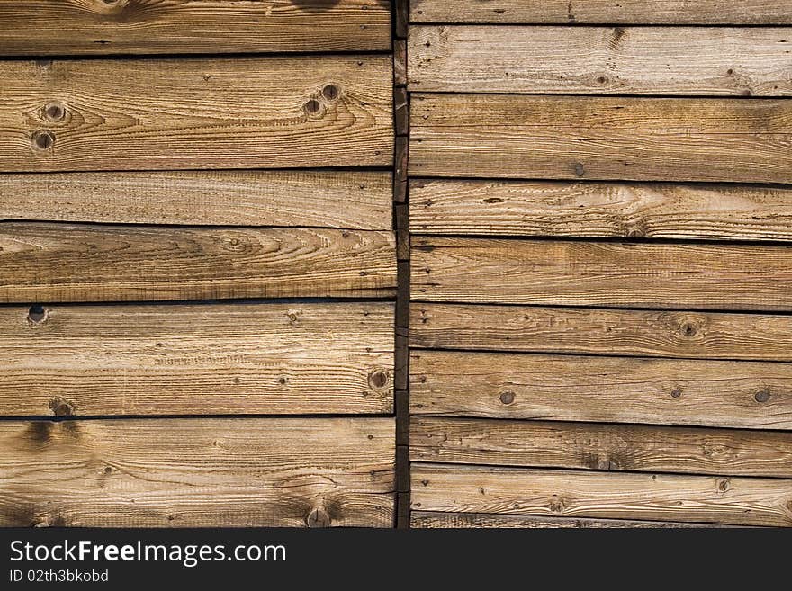 Old wooden planks on one house. Old wooden planks on one house.