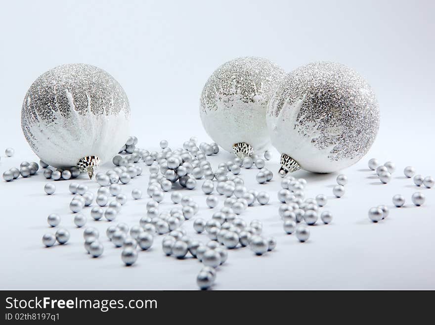 Silver balls on white background