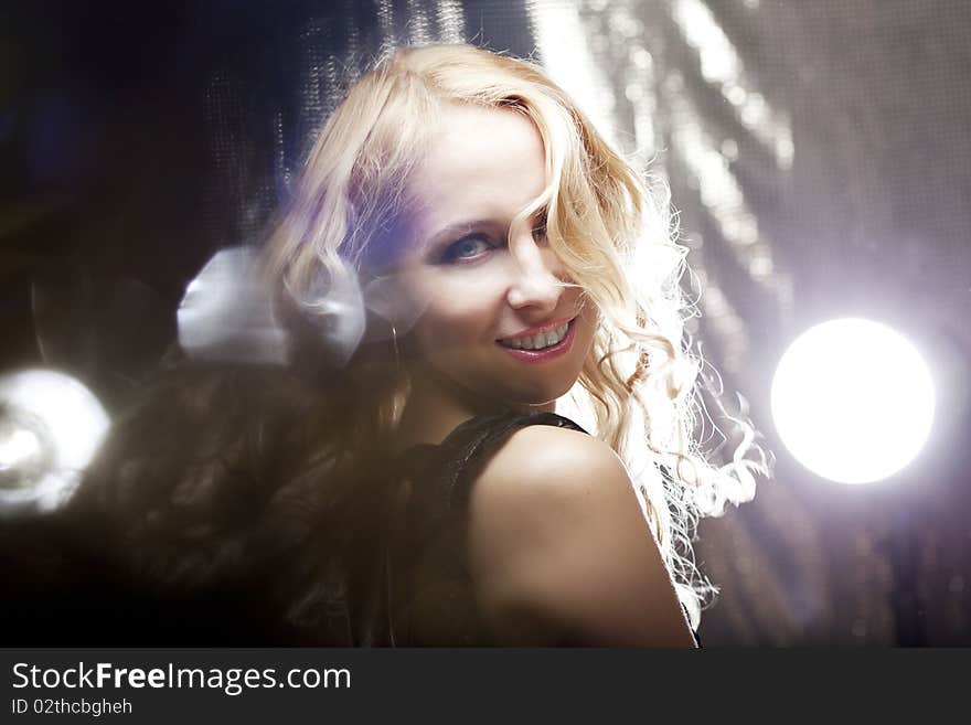 Beautiful Girl On A Dark Background