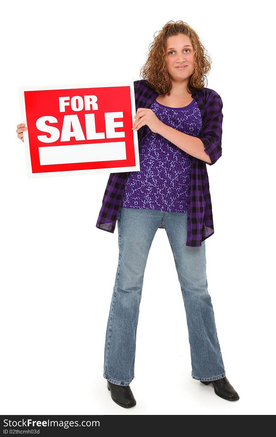 Beautiful american 13 year old teenager with red and white for sale sign over white background. Beautiful american 13 year old teenager with red and white for sale sign over white background.