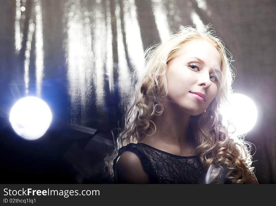 Beautiful Girl On A Dark Background