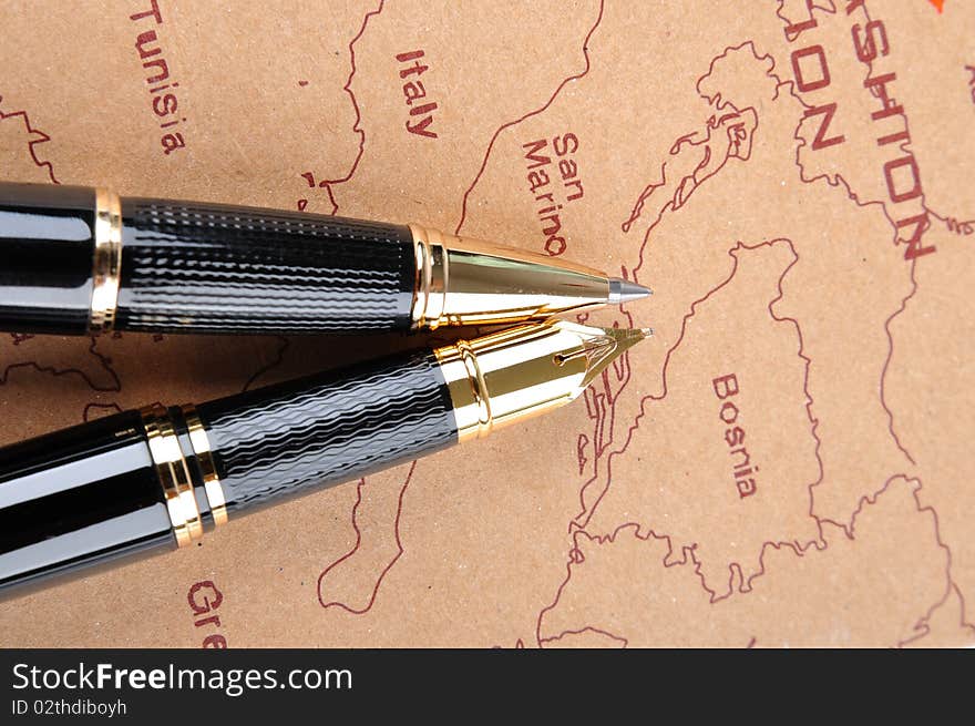 Two pens putting on a European map, means business and travel concept. Two pens putting on a European map, means business and travel concept.