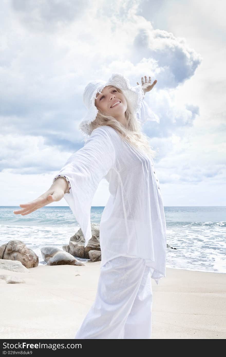 Portrait of nice young woman having good time on tropical beach. Portrait of nice young woman having good time on tropical beach