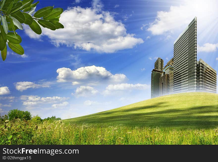 View of nice green hill on blue sky background. View of nice green hill on blue sky background