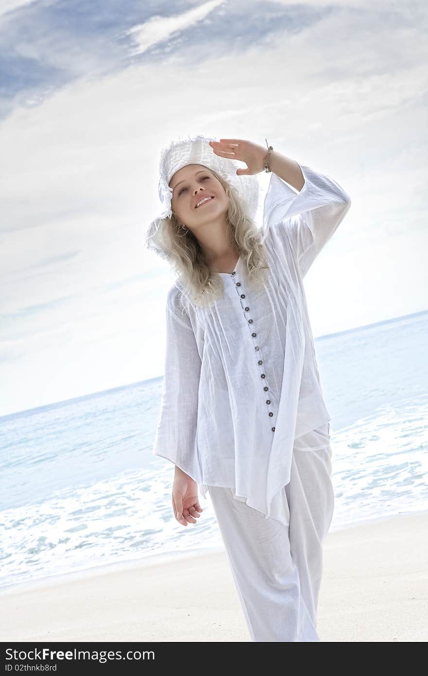 Portrait of nice young woman having good time on tropical beach. Portrait of nice young woman having good time on tropical beach