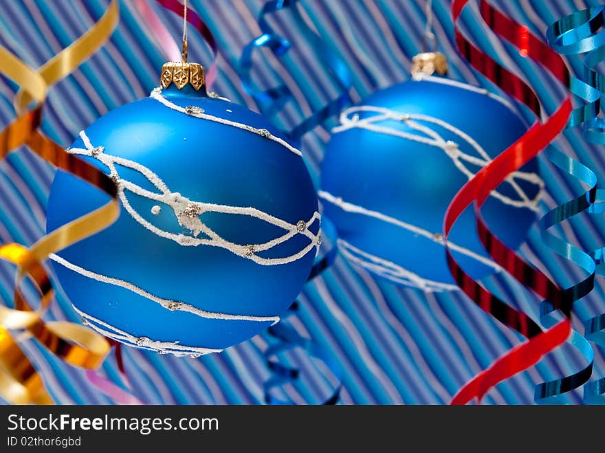 Christmas decoration from two blue balls. Studio shot