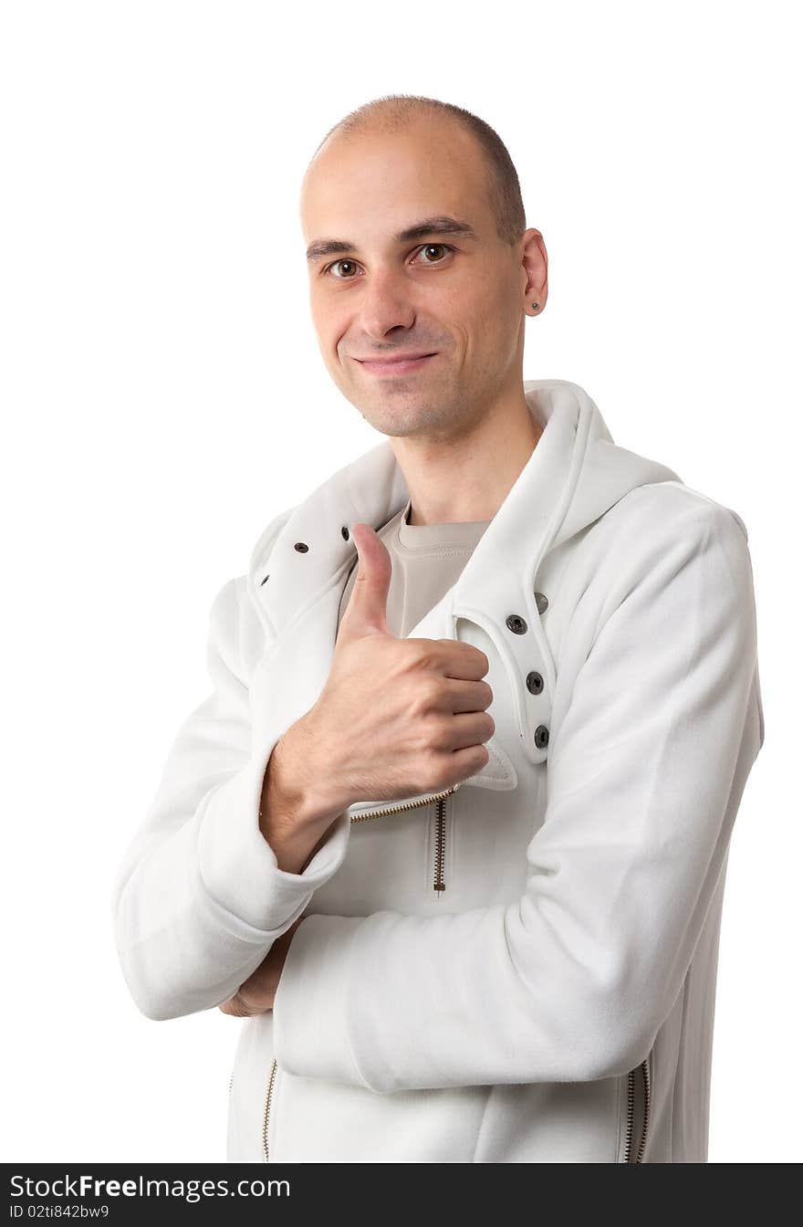 Happy casual young man showing thumb