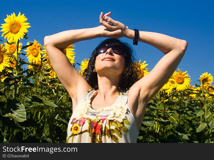 Young beautiful woman on field